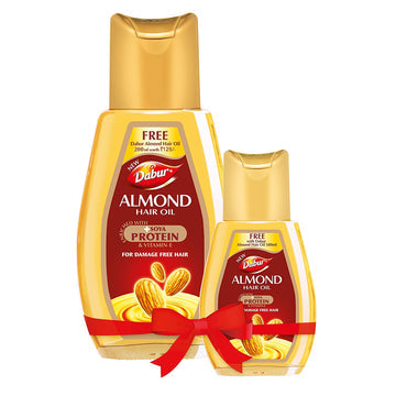 DABUR ALMOND HAIR OIL WITH ALMONDS , SOYA PROTEIN AND VITAMIN E FOR NON STICKY , DAMAGE FREE HAIR - 500ML